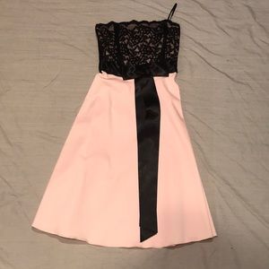 A pink with black lace dress